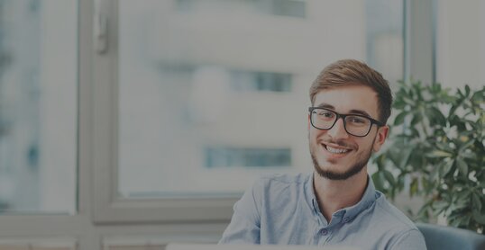 young business man smiles it jobs timetoact group